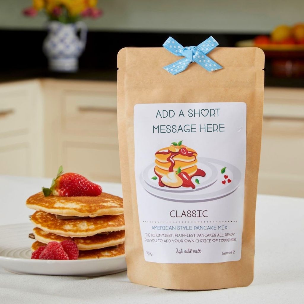 Personalised American style pancake mix pouch with ribbon and stack of pancakes